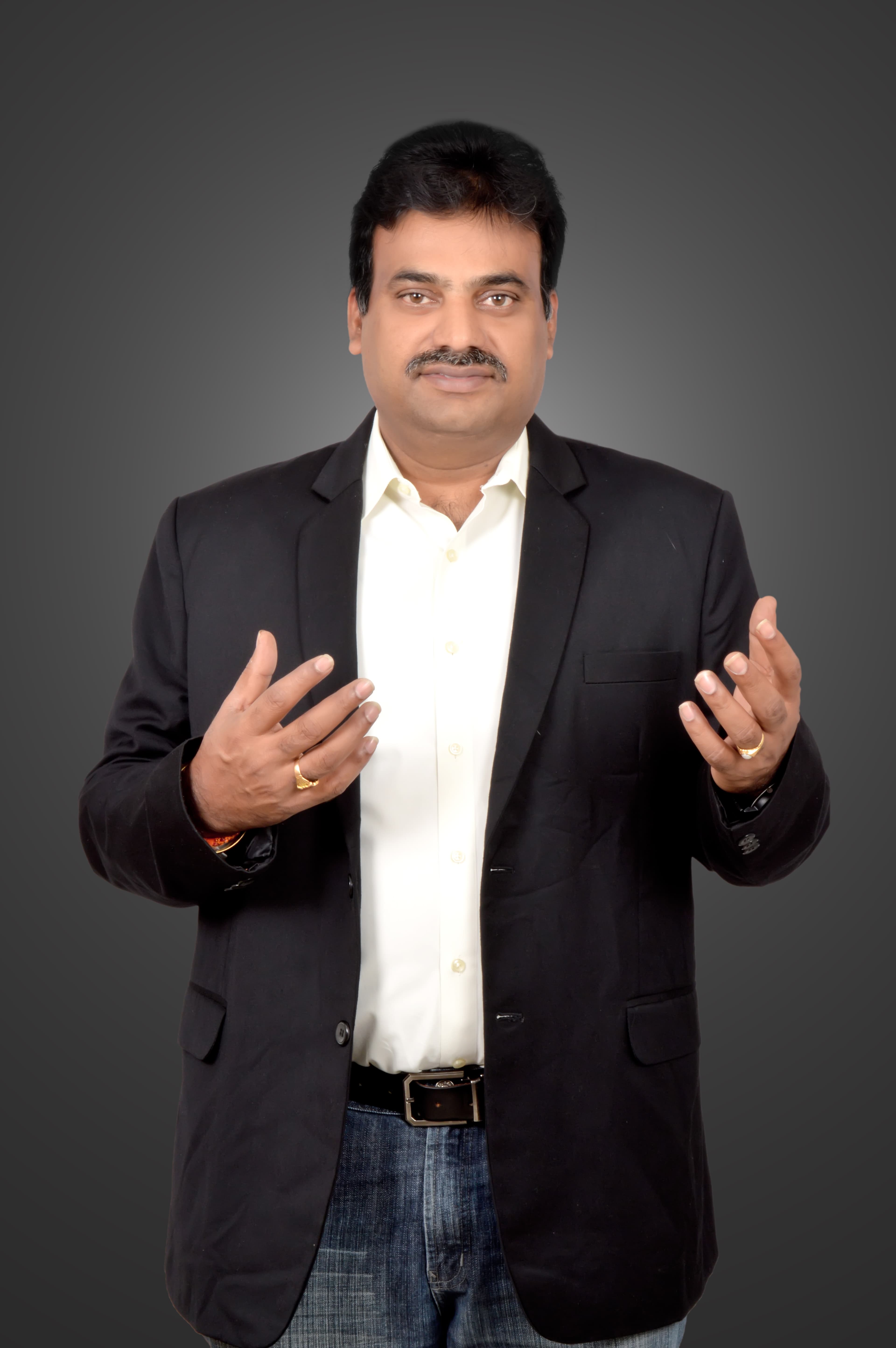 Dr. Koti Reddy Bhavanam speaking at a professional training session